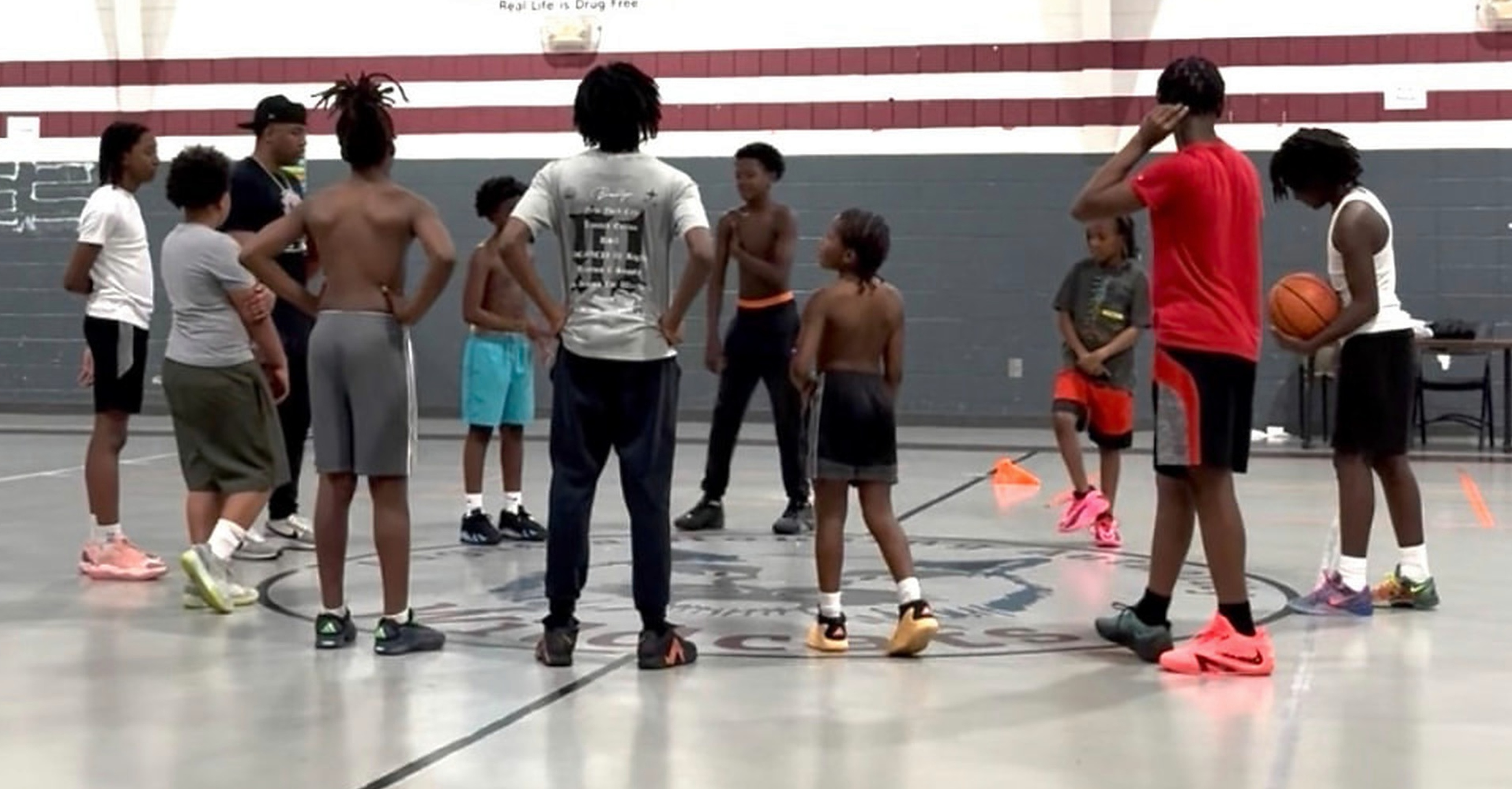 N.O.W. Wolves athletes and coaches together on the gym floor